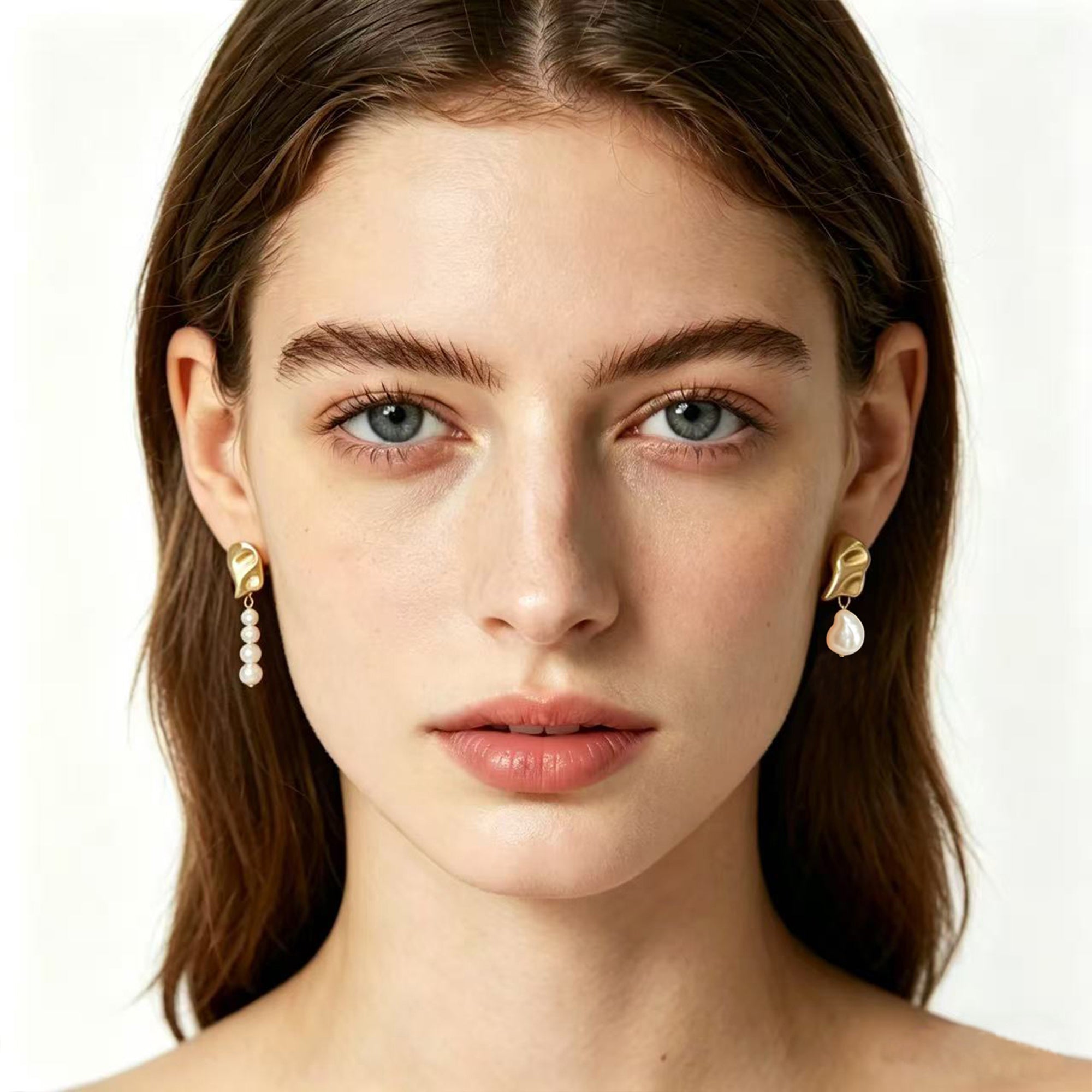 Asymmetric lustrous freshwater pearl stud earrings