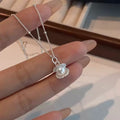 Baroque pearl shell-shaped silver necklace
